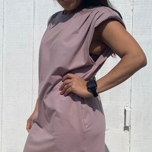 Lavender Sleeveless t-shirt dress w/shoulder pad, pockets. 95% cotton 5% spandex